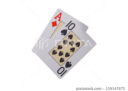 Playing cards and chips on a green cloth, a gambling game of blackjack or baccarat. Cards and chips 139147875