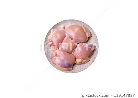 Raw chicken thigh fillet, boneless and skinless, for roasting. Raw thigh fillet 139147887