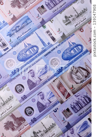 United Arab Emirates cash, dirhams and coins for exchange and financial transactions. UAE currency 139147908