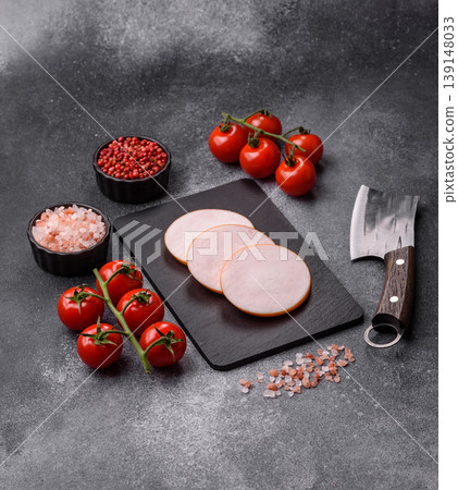 Chicken or Indian cooked sausage or ham sliced for breakfast sandwiches. Chicken sausage slices Chicken or Indian cooked sausage or ham sliced for breakfast sandwiches. Chicken sausage slices 139148033