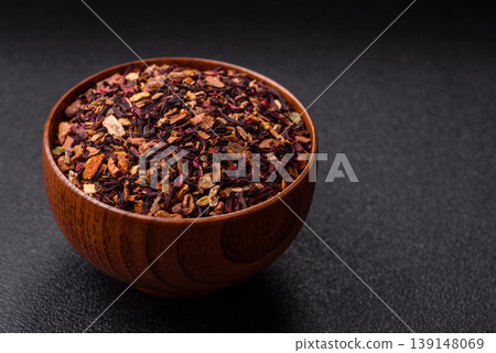 Dry herbal or fruit tea with flower petals and aromatic additives. Dry fruit herbal tea Dry herbal or fruit tea with flower petals and aromatic additives. Dry fruit herbal tea 139148069
