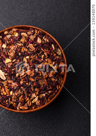 Dry herbal or fruit tea with flower petals and aromatic additives. Dry fruit herbal tea Dry herbal or fruit tea with flower petals and aromatic additives. Dry fruit herbal tea 139148070