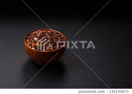 Dry herbal or fruit tea with flower petals and aromatic additives. Dry fruit herbal tea Dry herbal or fruit tea with flower petals and aromatic additives. Dry fruit herbal tea 139148072