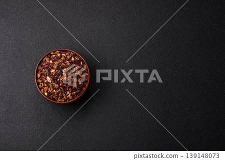 Dry herbal or fruit tea with flower petals and aromatic additives. Dry fruit herbal tea Dry herbal or fruit tea with flower petals and aromatic additives. Dry fruit herbal tea 139148073
