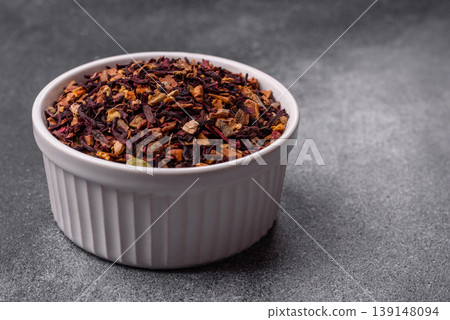 Dry herbal or fruit tea with flower petals and aromatic additives. Dry fruit herbal tea Dry herbal or fruit tea with flower petals and aromatic additives. Dry fruit herbal tea 139148094