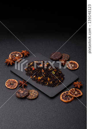 Dry black tea with herbal leaves and aromatic additives. Dry fruity black tea Dry black tea with herbal leaves and aromatic additives. Dry fruity black tea 139148123