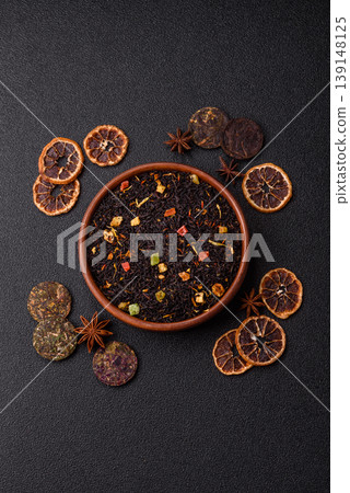 Dry black tea with herbal leaves and aromatic additives. Dry fruity black tea Dry black tea with herbal leaves and aromatic additives. Dry fruity black tea 139148125