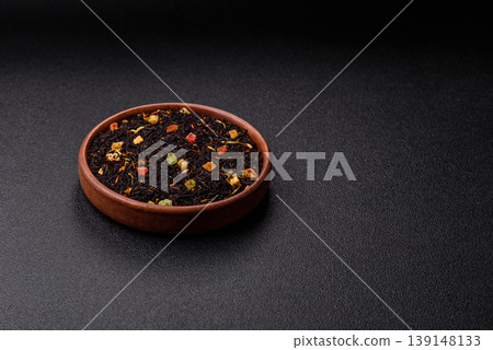 Dry black tea with herbal leaves and aromatic additives. Dry fruity black tea Dry black tea with herbal leaves and aromatic additives. Dry fruity black tea 139148133
