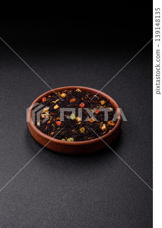 Dry black tea with herbal leaves and aromatic additives. Dry fruity black tea Dry black tea with herbal leaves and aromatic additives. Dry fruity black tea 139148135