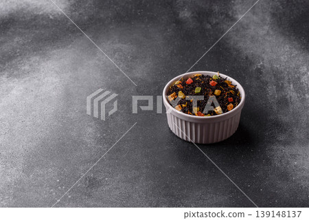 Dry black tea with herbal leaves and aromatic additives. Dry fruity black tea Dry black tea with herbal leaves and aromatic additives. Dry fruity black tea 139148137