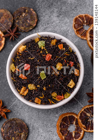 Dry black tea with herbal leaves and aromatic additives. Dry fruity black tea Dry black tea with herbal leaves and aromatic additives. Dry fruity black tea 139148144
