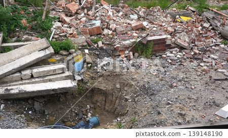 View to destroyed residential buildings at Kharkivska oblast. Ruined houses after bomb attacks on ukrainian territory from russia army. Consequences of russian invasion of Ukraine. Slow motion View to destroyed residential buildings at Kharkivska oblast. Ruined houses after bomb attacks on ukrainian territory from russia army. Consequences of russian invasion of Ukraine. Slow motion 139148190