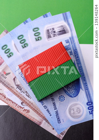 Cargo container on the uae flag as a conceptual backdrop for goods export. Cargo container Cargo container on the uae flag as a conceptual backdrop for goods export. Cargo container 139148264
