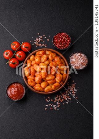 Homemade potato gnocchi with Bolognese sauce, seasoned with salt and spices. Gnocchi with sauce Homemade potato gnocchi with Bolognese sauce, seasoned with salt and spices. Gnocchi with sauce 139148341