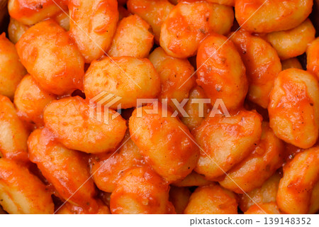 Homemade potato gnocchi with Bolognese sauce, seasoned with salt and spices. Gnocchi with sauce 139148352