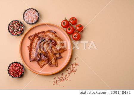 Fried fresh bacon slices with layers of meat or prosciutto prepared for breakfast. Fried bacon 139148481