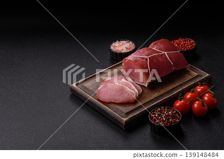 Smoked or dry cured meat slices, pork or ham with salt and spices. Smoked meat slices 139148484
