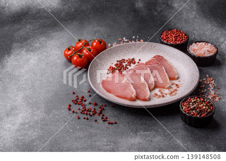 Smoked or dry cured meat slices, pork or ham with salt and spices. Smoked meat slices Smoked or dry cured meat slices, pork or ham with salt and spices. Smoked meat slices 139148508