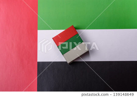 Cargo containers on the UAE flag as a conceptual backdrop for goods export. Cargo containers Cargo containers on the UAE flag as a conceptual backdrop for goods export. Cargo containers 139148649