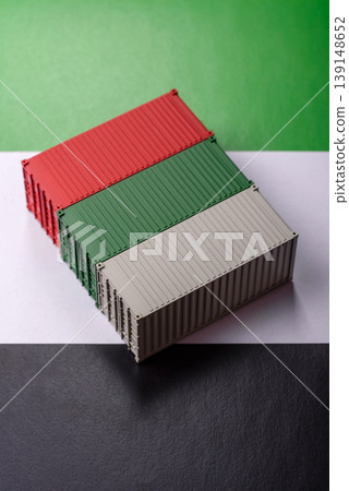 Cargo containers on the UAE flag as a conceptual backdrop for goods export. Cargo containers Cargo containers on the UAE flag as a conceptual backdrop for goods export. Cargo containers 139148652