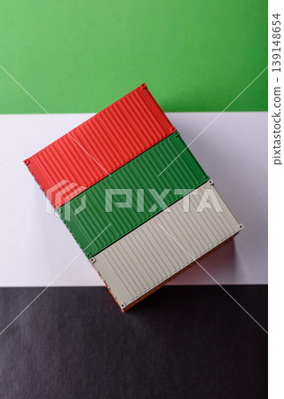 Cargo containers on the UAE flag as a conceptual backdrop for goods export. Cargo containers Cargo containers on the UAE flag as a conceptual backdrop for goods export. Cargo containers 139148654