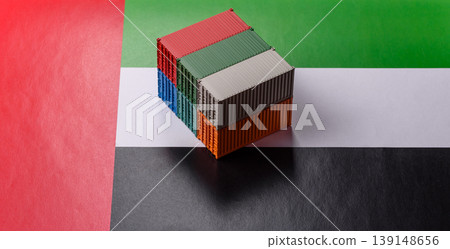 Cargo containers on the UAE flag as a conceptual backdrop for goods export. Cargo containers Cargo containers on the UAE flag as a conceptual backdrop for goods export. Cargo containers 139148656