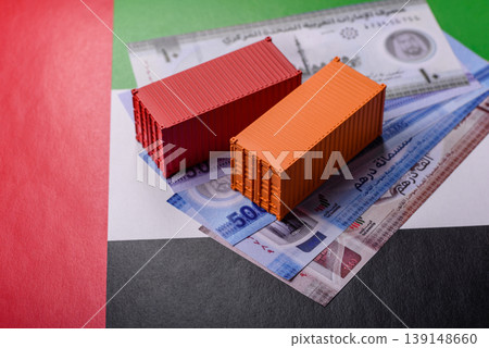Cargo containers on the UAE flag as a conceptual backdrop for goods export. Cargo containers Cargo containers on the UAE flag as a conceptual backdrop for goods export. Cargo containers 139148660