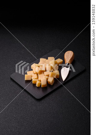 Parmesan cheese cubes for pasta, salads, and other Italian dishes. Parmesan cheese Parmesan cheese cubes for pasta, salads, and other Italian dishes. Parmesan cheese 139148832