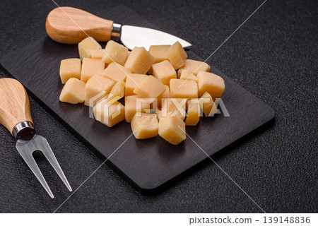Parmesan cheese cubes for pasta, salads, and other Italian dishes. Parmesan cheese 139148836