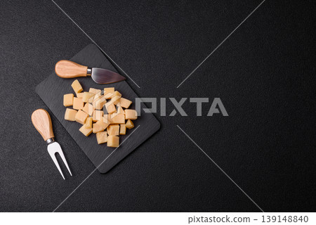 Parmesan cheese cubes for pasta, salads, and other Italian dishes. Parmesan cheese Parmesan cheese cubes for pasta, salads, and other Italian dishes. Parmesan cheese 139148840