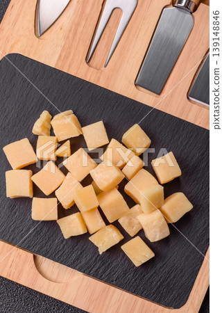 Parmesan cheese cubes for pasta, salads, and other Italian dishes. Parmesan cheese 139148846