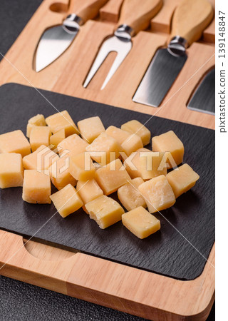 Parmesan cheese cubes for pasta, salads, and other Italian dishes. Parmesan cheese Parmesan cheese cubes for pasta, salads, and other Italian dishes. Parmesan cheese 139148847