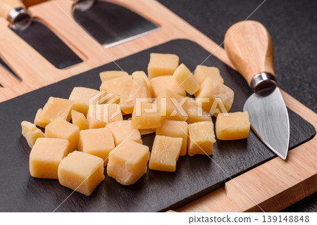 Parmesan cheese cubes for pasta, salads, and other Italian dishes. Parmesan cheese 139148848
