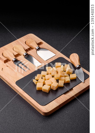 Parmesan cheese cubes for pasta, salads, and other Italian dishes. Parmesan cheese Parmesan cheese cubes for pasta, salads, and other Italian dishes. Parmesan cheese 139148853