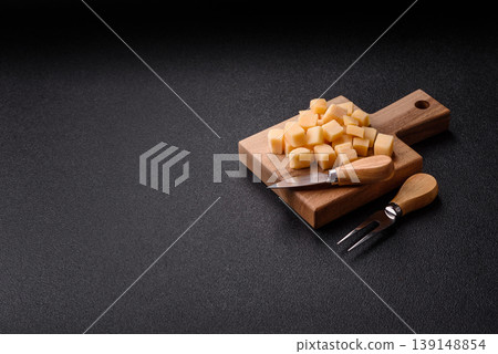Parmesan cheese cubes for pasta, salads, and other Italian dishes. Parmesan cheese Parmesan cheese cubes for pasta, salads, and other Italian dishes. Parmesan cheese 139148854