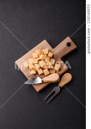 Parmesan cheese cubes for pasta, salads, and other Italian dishes. Parmesan cheese Parmesan cheese cubes for pasta, salads, and other Italian dishes. Parmesan cheese 139148855