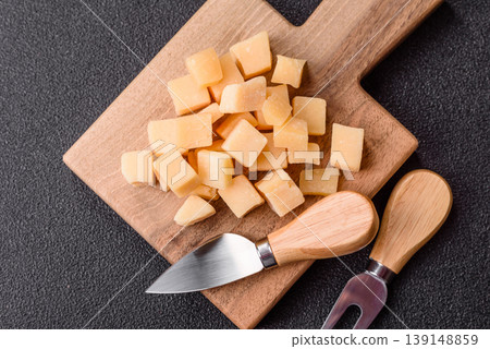 Parmesan cheese cubes for pasta, salads, and other Italian dishes. Parmesan cheese 139148859