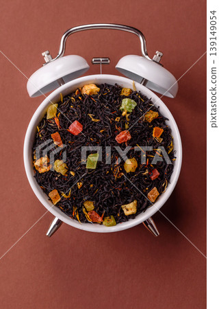 Dry black tea with herbal leaves and aromatic additives. Dry fruity black tea Dry black tea with herbal leaves and aromatic additives. Dry fruity black tea 139149054