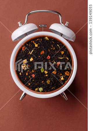 Dry black tea with herbal leaves and aromatic additives. Dry fruity black tea Dry black tea with herbal leaves and aromatic additives. Dry fruity black tea 139149055