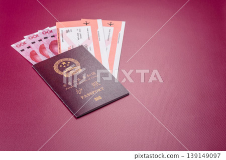 China, Chinese passport with money and flight tickets. Chinese passport China, Chinese passport with money and flight tickets. Chinese passport 139149097