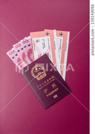 China, Chinese passport with money and flight tickets. Chinese passport China, Chinese passport with money and flight tickets. Chinese passport 139149098