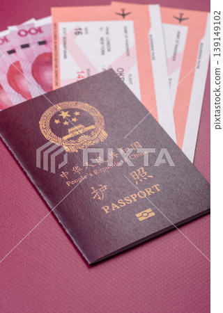 China, Chinese passport with money and flight tickets. Chinese passport China, Chinese passport with money and flight tickets. Chinese passport 139149102