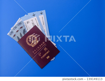 China, Chinese passport with money and flight tickets. Chinese passport China, Chinese passport with money and flight tickets. Chinese passport 139149113