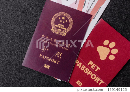 China, Chinese passport with money and flight tickets. Chinese passport China, Chinese passport with money and flight tickets. Chinese passport 139149123