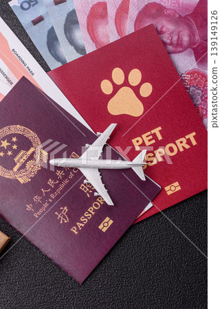 China, Chinese passport with money and flight tickets. Chinese passport China, Chinese passport with money and flight tickets. Chinese passport 139149126