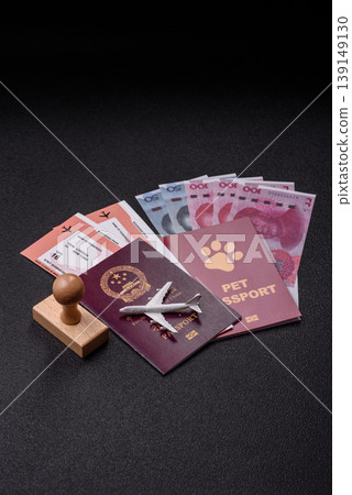 China, Chinese passport with money and flight tickets. Chinese passport China, Chinese passport with money and flight tickets. Chinese passport 139149130