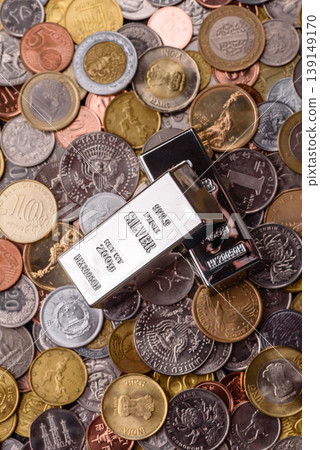 A silver bar, white metal against a backdrop of money, as a concept for the sales. A silver bar A silver bar, white metal against a backdrop of money, as a concept for the sales. A silver bar 139149170