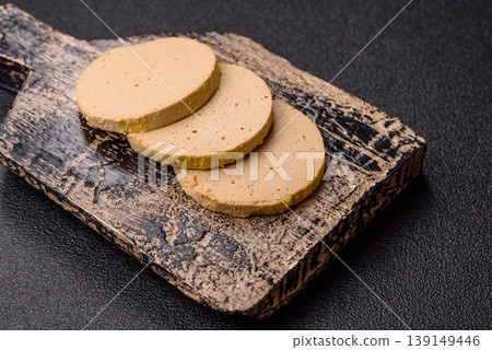 Foie gras, sliced chicken liver with fruit jam for French toast. Foie gras Foie gras, sliced chicken liver with fruit jam for French toast. Foie gras 139149446