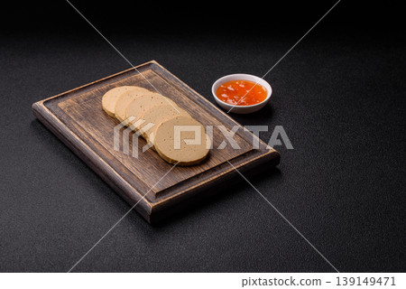 Foie gras, sliced chicken liver with fruit jam for French toast. Foie gras Foie gras, sliced chicken liver with fruit jam for French toast. Foie gras 139149471
