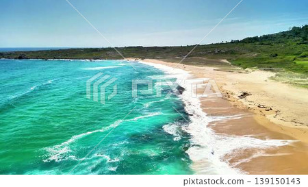 A Beautiful and Scenic View of a Tranquil Beach with Beautiful Turquoise Waters Awaiting A Beautiful and Scenic View of a Tranquil Beach with Beautiful Turquoise Waters Awaiting 139150143